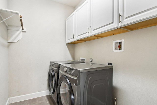 3213 Venezia Vw, Leander, TX 78641 - laundry area with hookup for a washing machine, cabinet space, and tile patterned flooring