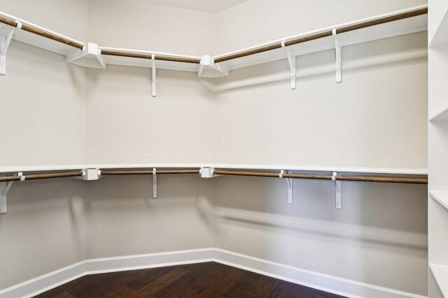 3213 Venezia Vw, Leander, TX 78641 - walk in closet featuring dark wood-type flooring