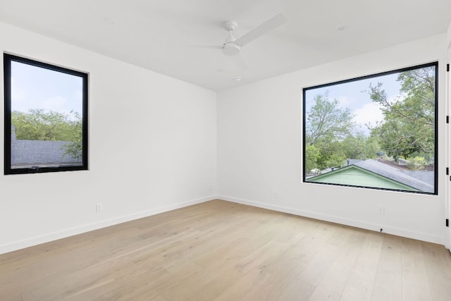 501 E 50th St, Austin, TX 78751 - spare room with light wood-style floors and ceiling fan