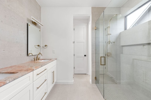 501 E 50th St, Austin, TX 78751 - bathroom featuring a stall shower and double vanity