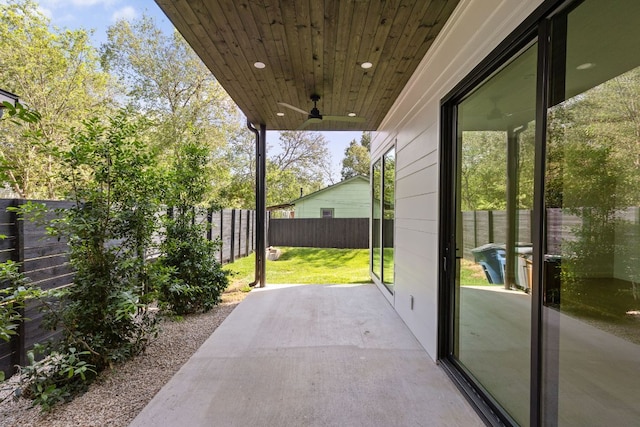 501 E 50th St, Austin, TX 78751 - fenced backyard with a ceiling fan and a patio area