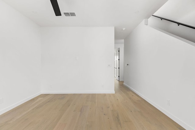 501 E 50th St, Austin, TX 78751 - empty room with a ceiling fan and light wood-style flooring