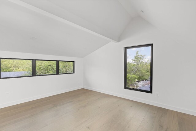 501 E 50th St, Austin, TX 78751 - additional living space with lofted ceiling and light wood finished floors