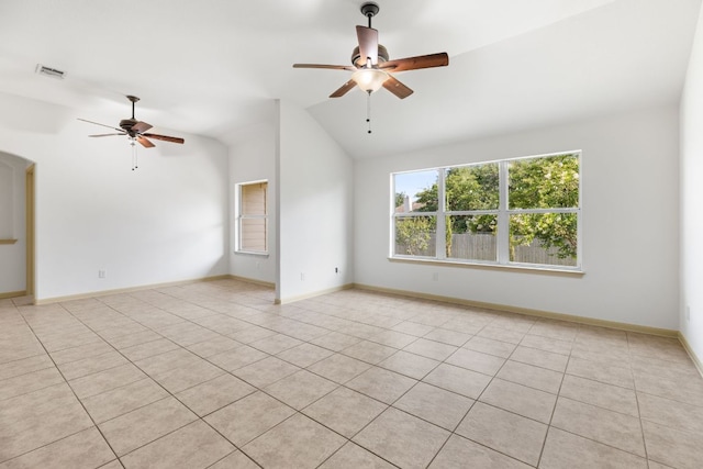 325 Swenson Dr, Hutto, TX 78634 - spare room with ceiling fan, lofted ceiling, and light tile patterned flooring