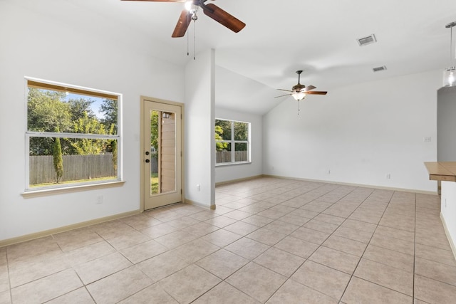 325 Swenson Dr, Hutto, TX 78634 - empty room featuring ceiling fan, lofted ceiling, and light tile patterned flooring