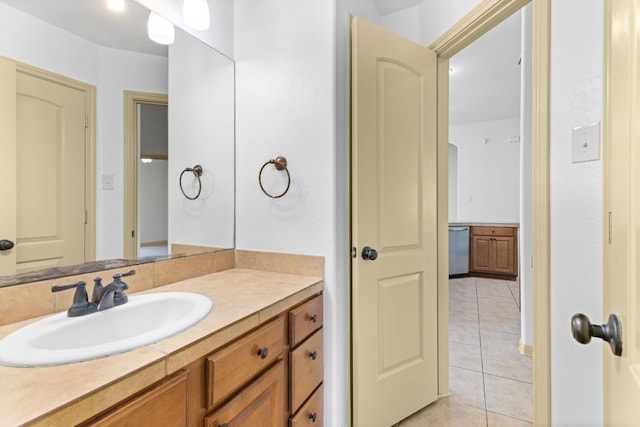 325 Swenson Dr, Hutto, TX 78634 - bathroom featuring tile patterned floors and vanity