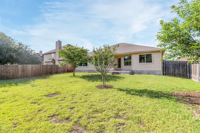 325 Swenson Dr, Hutto, TX 78634 - rear view of house featuring a fenced backyard