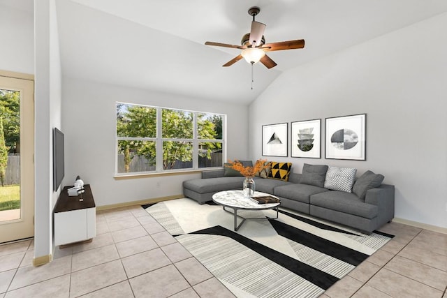 325 Swenson Dr, Hutto, TX 78634 - living room featuring light tile patterned flooring, vaulted ceiling, and a ceiling fan