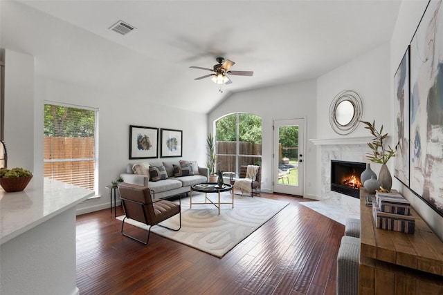 4608 Hibiscus Valley Dr, Austin, TX 78739 - living area featuring a ceiling fan, a high end fireplace, lofted ceiling, and wood finished floors