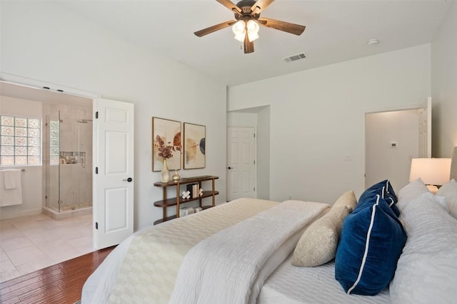 4608 Hibiscus Valley Dr, Austin, TX 78739 - bedroom with wood finished floors, ceiling fan, and ensuite bath
