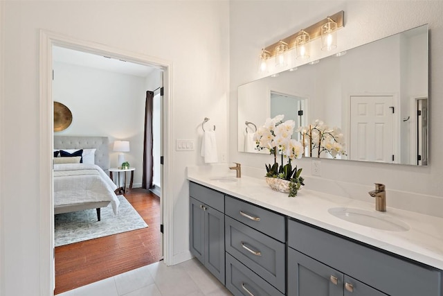 4608 Hibiscus Valley Dr, Austin, TX 78739 - bathroom featuring double vanity and tile patterned flooring