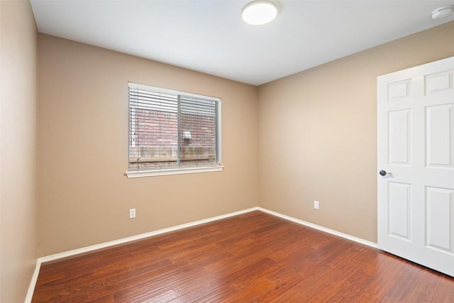 4608 Hibiscus Valley Dr, Austin, TX 78739 - spare room featuring a smoke detector and wood finished floors