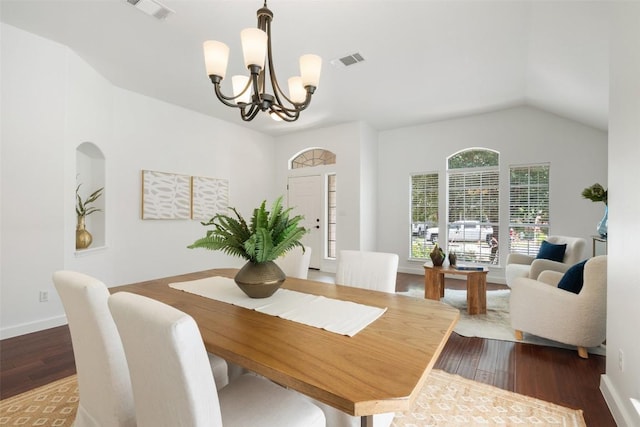 4608 Hibiscus Valley Dr, Austin, TX 78739 - dining room with a chandelier, wood finished floors, and vaulted ceiling