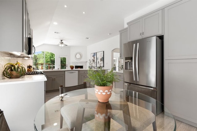 4608 Hibiscus Valley Dr, Austin, TX 78739 - dining space featuring arched walkways, ceiling fan, and recessed lighting