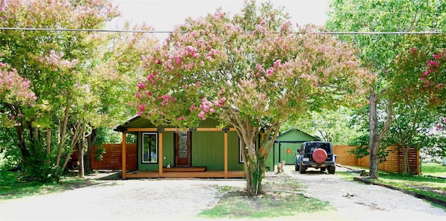 545 W Vaughan St, Bertram, TX 78605 - view of front of property with dirt driveway and covered porch