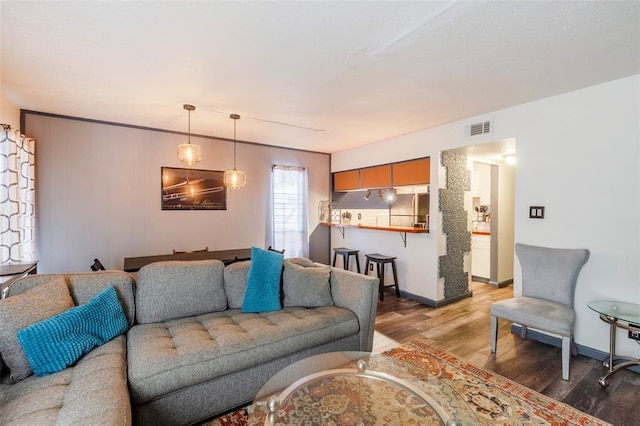 3431 N Hills Dr Unit 115, Austin, TX 78731 - living area with wood finished floors and baseboards