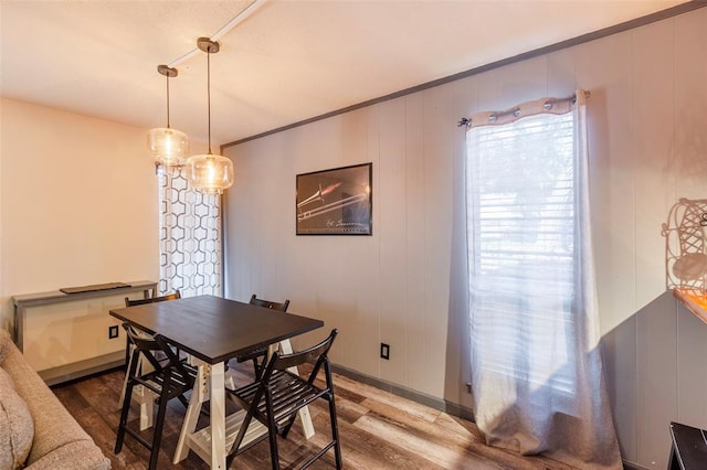 3431 N Hills Dr Unit 115, Austin, TX 78731 - dining space with wood finished floors and baseboards