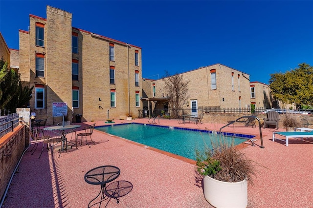 3431 N Hills Dr Unit 115, Austin, TX 78731 - community pool with a patio area