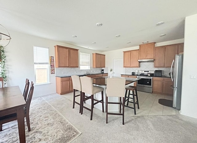 12637 Orchard Grove Ln, Manor, TX 78653 - dining area featuring healthy amount of natural light and light colored carpet