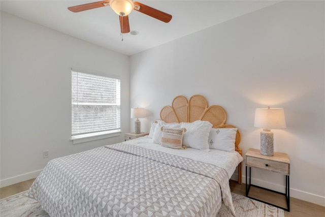 12166 Metric Blvd Unit 103, Austin, TX 78758 - bedroom featuring baseboards and ceiling fan
