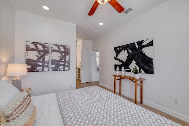 12166 Metric Blvd Unit 103, Austin, TX 78758 - bedroom featuring wood finished floors, recessed lighting, and a ceiling fan