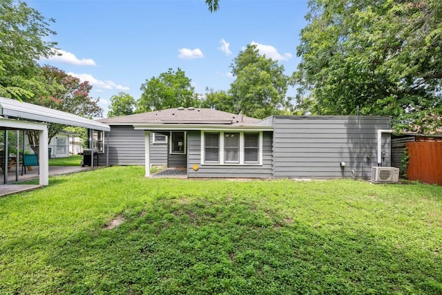1211 S Church St, Georgetown, TX 78626 - back of house with a patio area and a detached carport