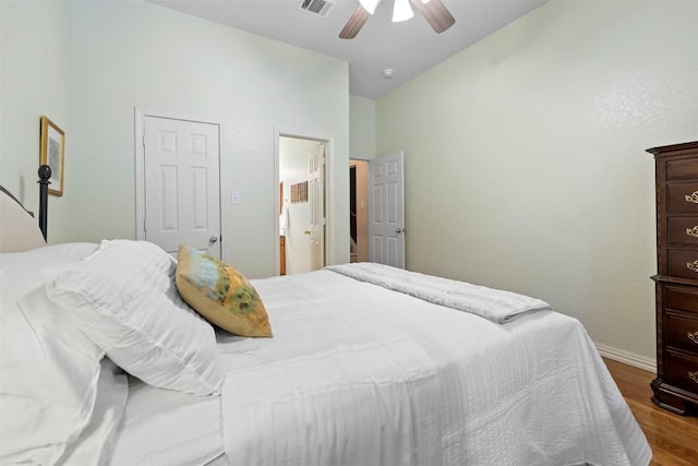 9920 Michelle Hl, Garden Ridge, TX 78266 - bedroom with wood finished floors, lofted ceiling, and a ceiling fan