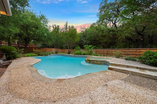 9920 Michelle Hl, Garden Ridge, TX 78266 - view of pool with a fenced backyard and a pool with connected hot tub