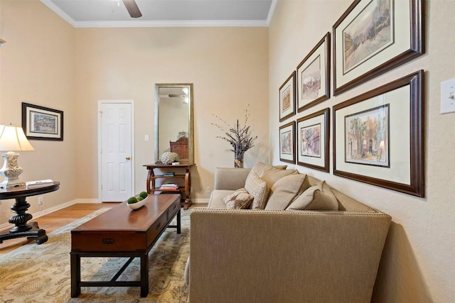 9920 Michelle Hl, Garden Ridge, TX 78266 - living area with wood finished floors, a ceiling fan, and crown molding