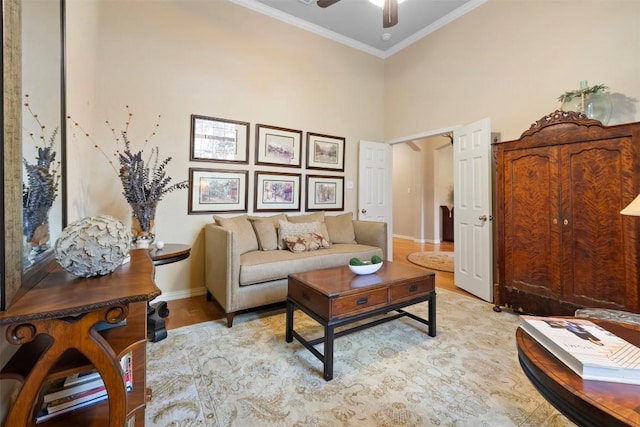 9920 Michelle Hl, Garden Ridge, TX 78266 - living area with ceiling fan, ornamental molding, and light wood-style floors