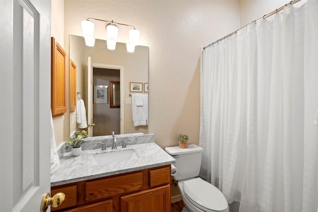 9920 Michelle Hl, Garden Ridge, TX 78266 - full bathroom with vanity, a textured wall, and curtained shower
