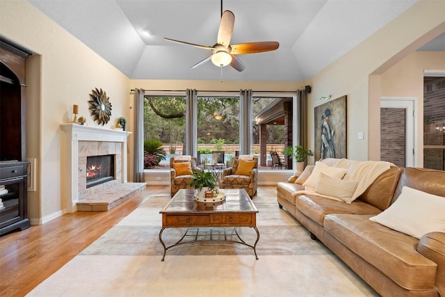 9920 Michelle Hl, Garden Ridge, TX 78266 - living area with lofted ceiling, a ceiling fan, light wood finished floors, and a fireplace