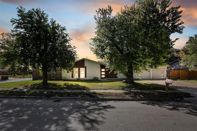 10410 Quail Ridge Dr, Austin, TX 78758 - view of front of property with driveway and a garage