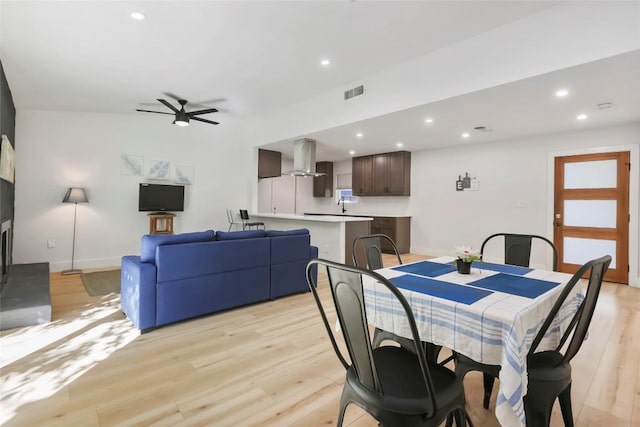 10410 Quail Ridge Dr, Austin, TX 78758 - dining space with light wood finished floors, a ceiling fan, and recessed lighting