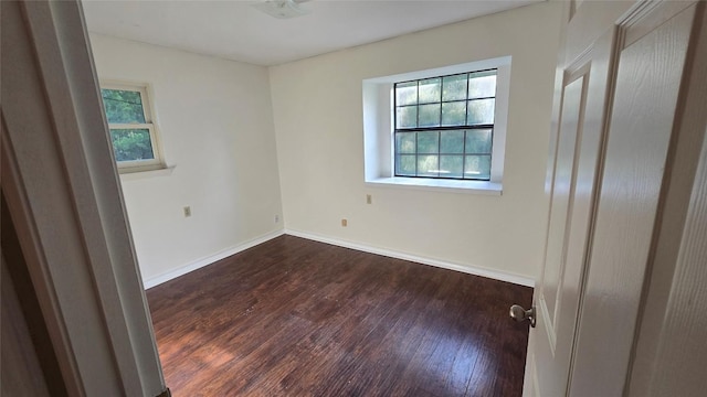 365 Pine Tree Loop, Bastrop, TX 78602 - empty room with dark wood-style flooring and baseboards