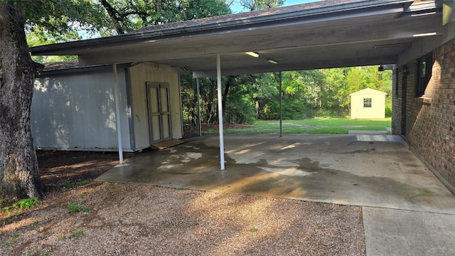 365 Pine Tree Loop, Bastrop, TX 78602 - view of car parking featuring a storage unit and an attached carport