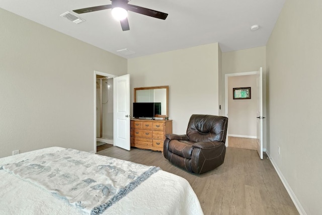 603 Luna Vista Dr, Hutto, TX 78634 - bedroom with wood finished floors and ceiling fan