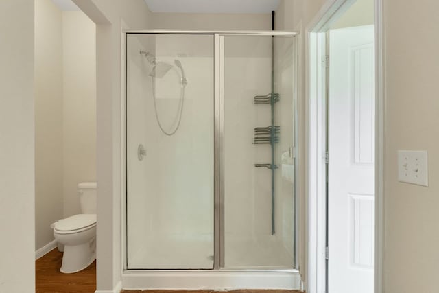 603 Luna Vista Dr, Hutto, TX 78634 - full bath featuring a stall shower and wood finished floors
