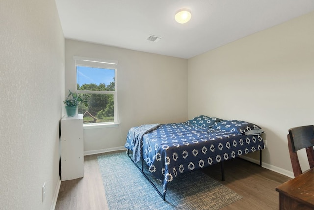 603 Luna Vista Dr, Hutto, TX 78634 - bedroom with wood finished floors