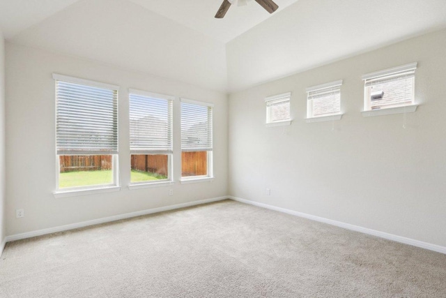 20025 Rhiannon Ln, Pflugerville, TX 78660 - empty room featuring ceiling fan, carpet, and vaulted ceiling