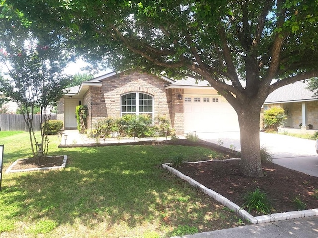 1013 Henderson Dr, Leander, TX 78641 - view of front of home featuring concrete driveway, a garage, brick siding, and stone siding