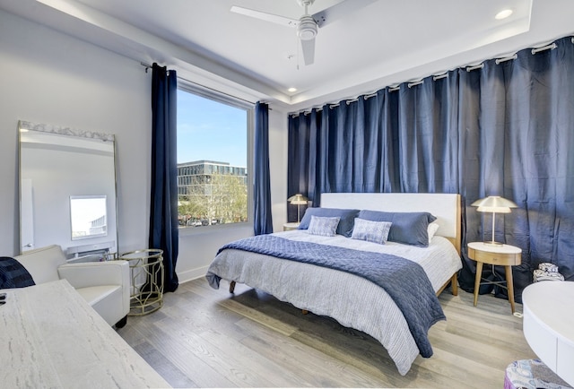 1800 E 4th St Unit 263, Austin, TX 78702 - bedroom featuring wood finished floors, a ceiling fan, and recessed lighting