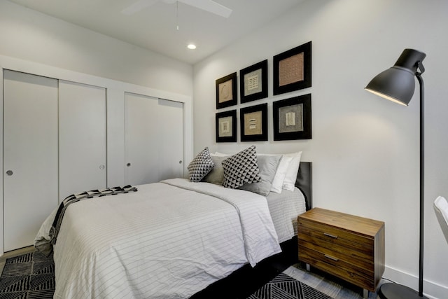 1800 E 4th St Unit 263, Austin, TX 78702 - bedroom featuring two closets, ceiling fan, and recessed lighting