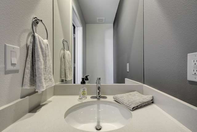 1800 E 4th St Unit 263, Austin, TX 78702 - bathroom with a textured wall and vanity