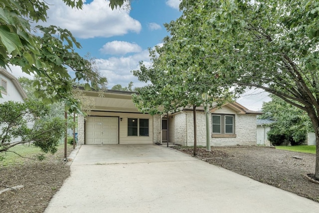13116 Billiem Dr, Austin, TX 78727 - view of front of home with driveway and a garage