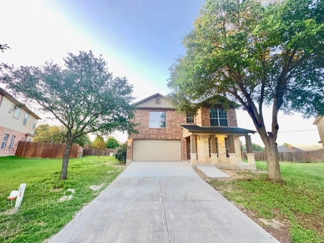 1237 Pelican Pl, New Braunfels, TX 78130 - traditional home featuring an attached garage, concrete driveway, a porch, and brick siding