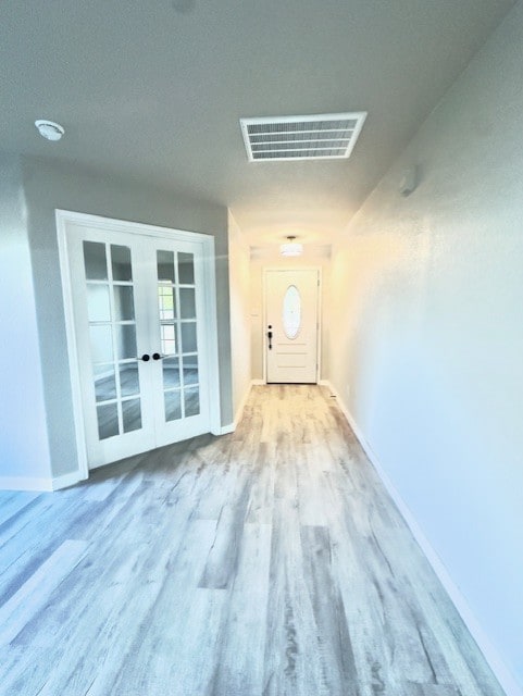 1237 Pelican Pl, New Braunfels, TX 78130 - entryway featuring french doors and wood finished floors
