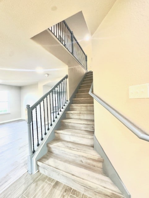 1237 Pelican Pl, New Braunfels, TX 78130 - stairs with wood finished floors