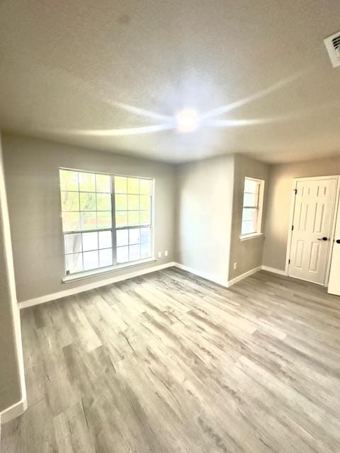 1237 Pelican Pl, New Braunfels, TX 78130 - spare room with baseboards and wood finished floors