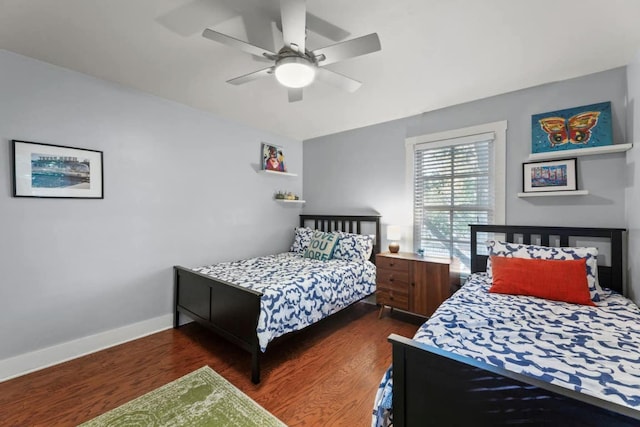 611 W Johanna St, Austin, TX 78704 - bedroom featuring dark wood finished floors and a ceiling fan
